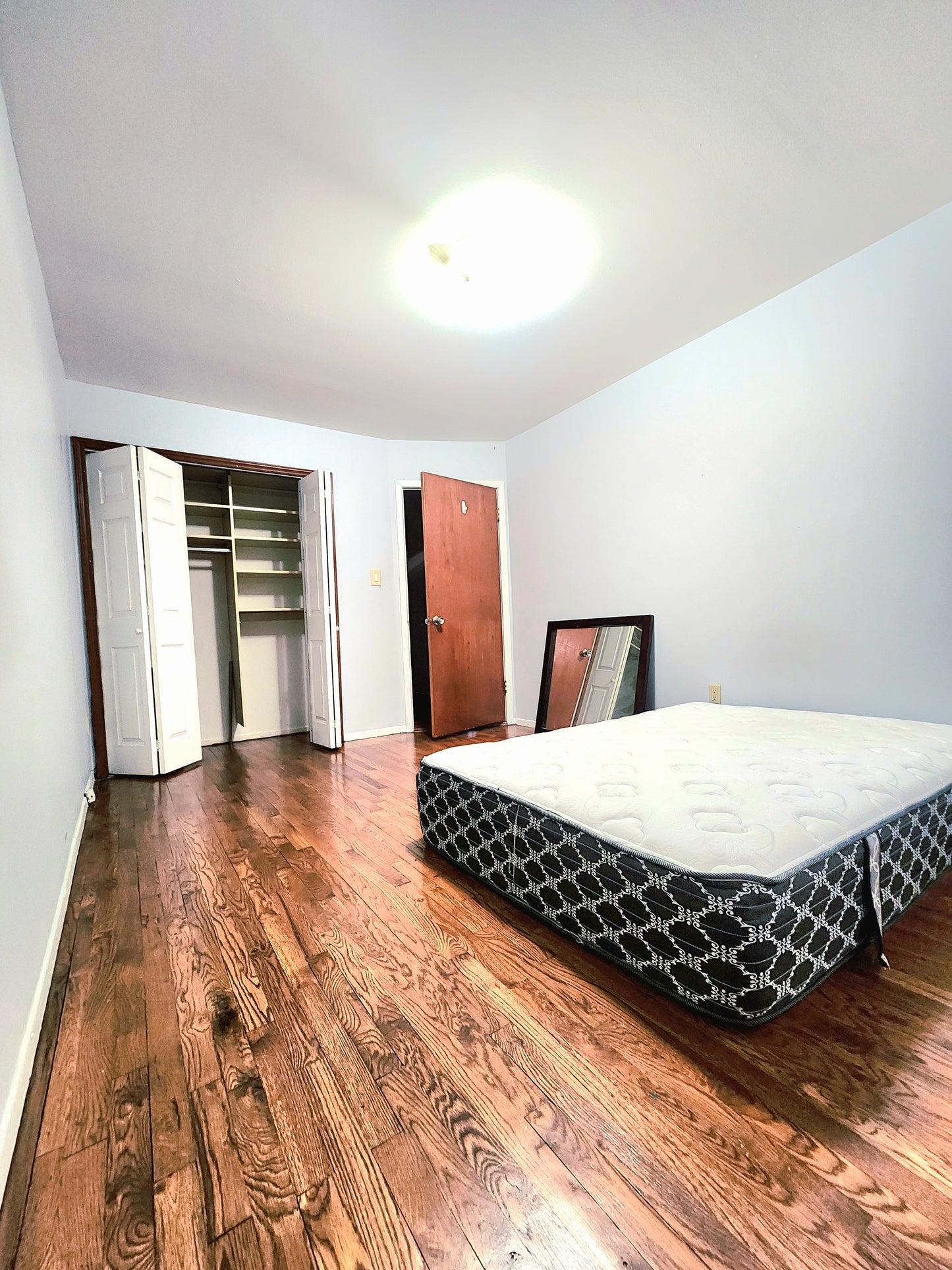 Private room in a quiet, recently renovated home located in Middle Village, Queens.
