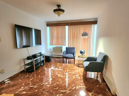 Private room in a quiet, recently renovated home located in Middle Village, Queens.