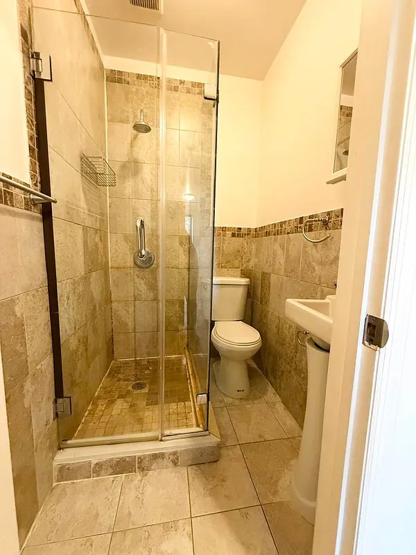 Large luxurious 1 bed in beautiful updated Brownstone located on one of the most beautiful desirable blocks in Central Harlem