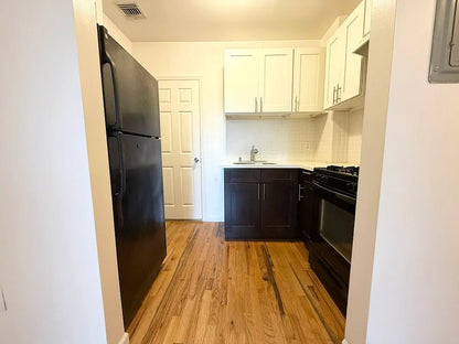 Large luxurious 1 bed in beautiful updated Brownstone located on one of the most beautiful desirable blocks in Central Harlem