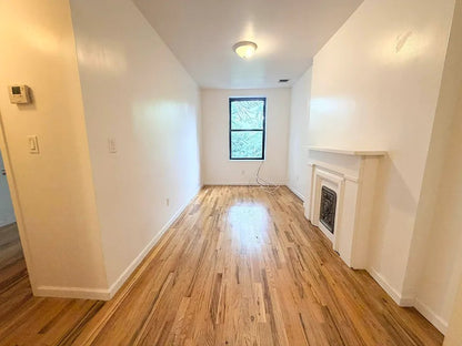 Large luxurious 1 bed in beautiful updated Brownstone located on one of the most beautiful desirable blocks in Central Harlem