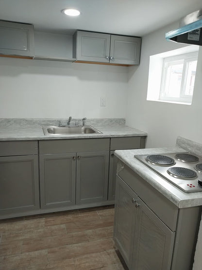 One room basement located in Newark, New Jersey