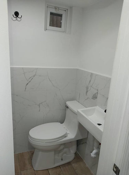 One room basement located in Newark, New Jersey