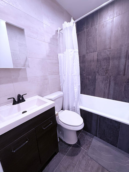 Room for rent with private bathroom and laundry — Only one woman lives in the apartment.